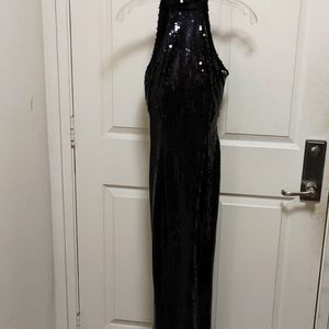 A black sequence long dress